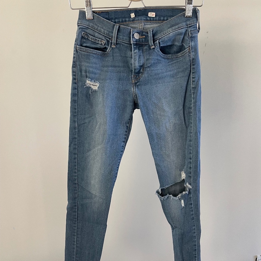 Ripped Levi's Mid Rise Skinny Jeans